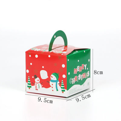 Bolo do Natal que enverniza caixas feitas sob encomenda do empacotamento de alimento com janela